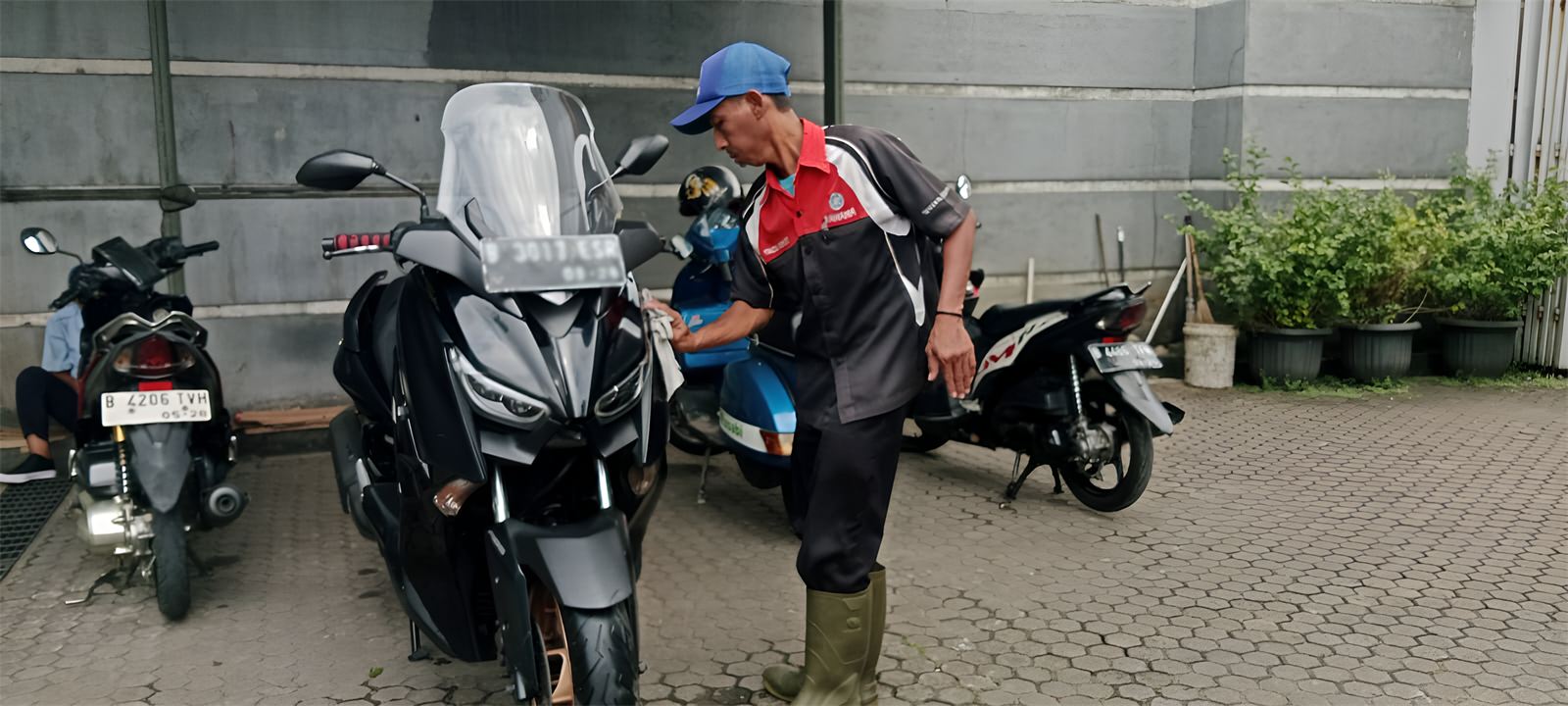 Cuci motor gratis